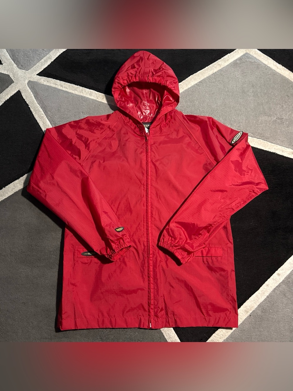 Red vintage Stearns lightweight raincoat windbreaker jacket